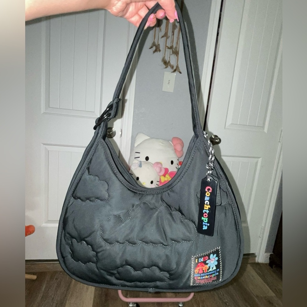 Coachtopia quilted ergo bag